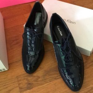 Calvin Klein Women’s Delta Patent Tie Up Shoes
